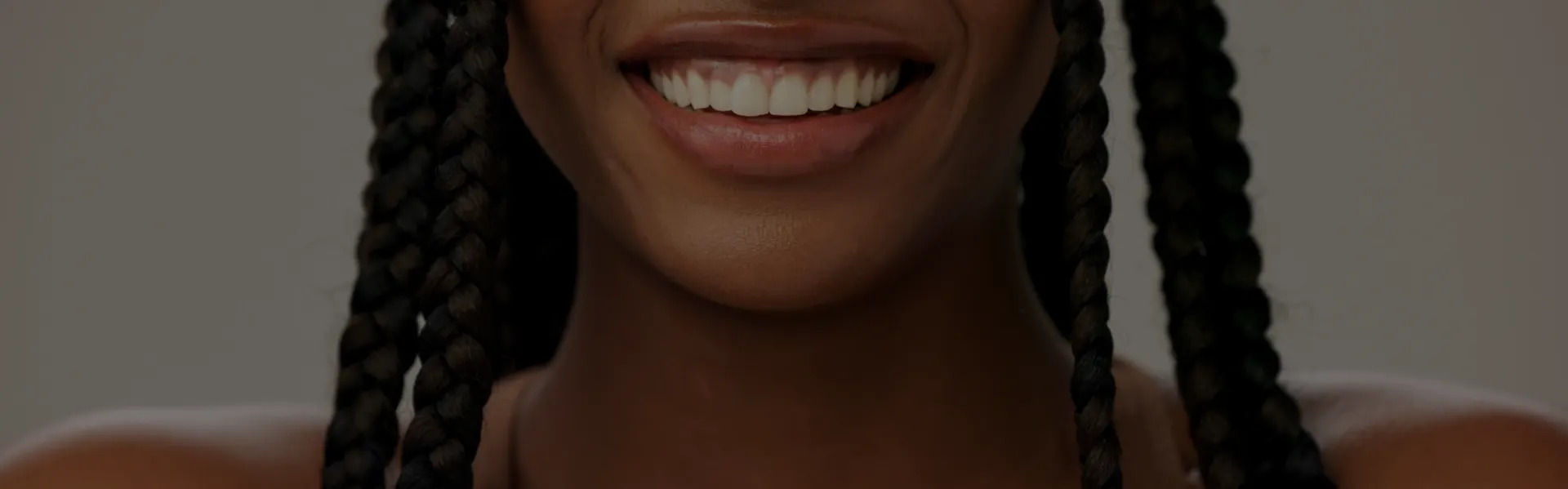 Woman with braided hair smiling