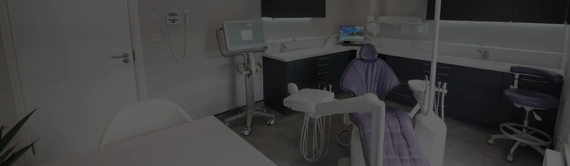 Treatment room at York House with the dental chair and scanner
